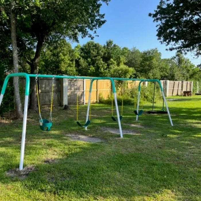 The swing set at Salt Bayou Kampground RV Park